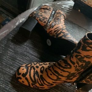 Calvin Klein boots are brand new. Size 9